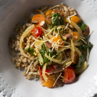 Shows an image of a white bowl containing Italian Herbed Farro