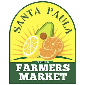 Shows the logo for the Santa Paula Farmers Market. Has a yellow background that says Santa Paula and underneath the text is a graphic of lemons, oranges, and avocado. Below that there is a green strip that says Farmers Market.